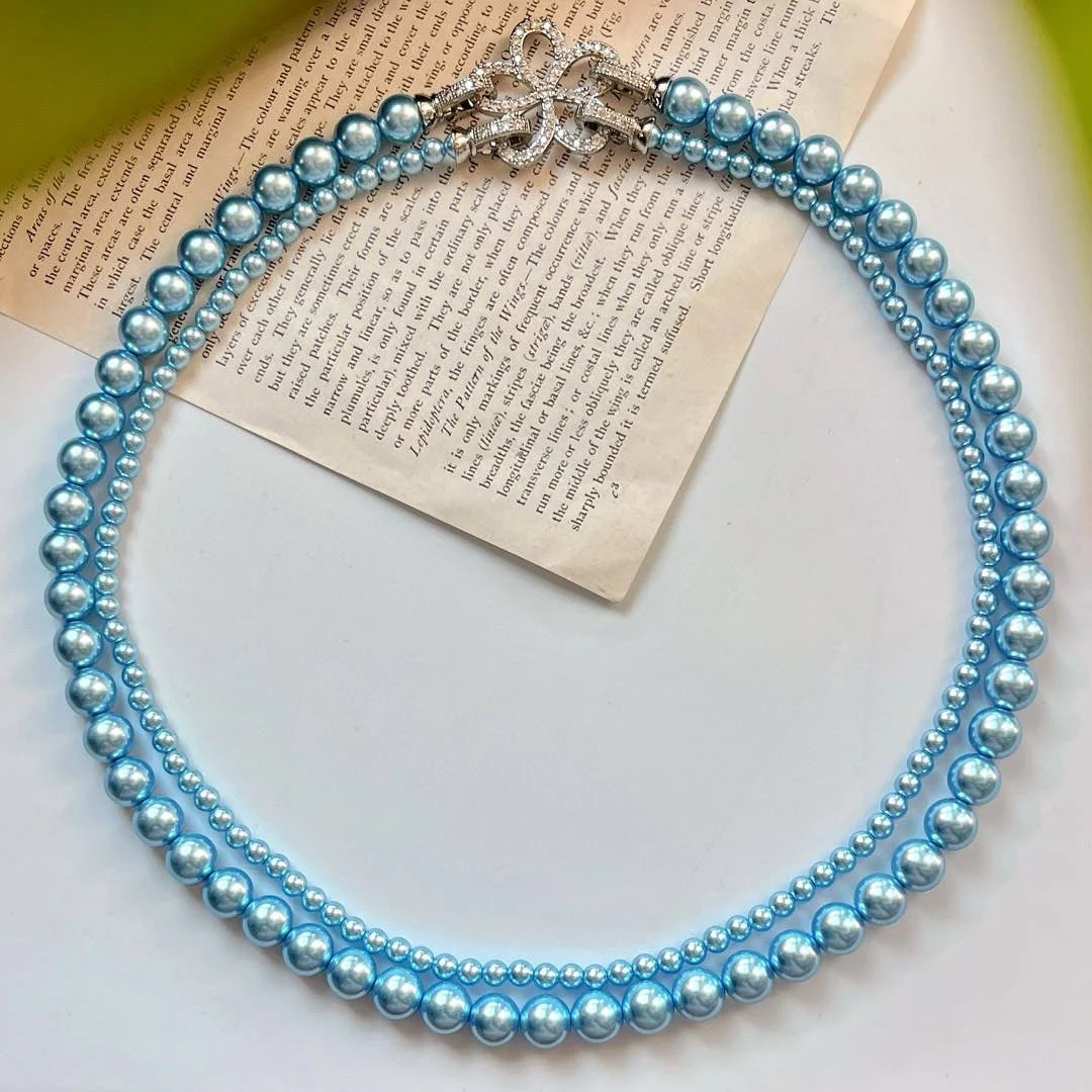 

New Chinese retro design sense removable double-layer blue enchantress artificial crystal pearl collarbone chain sweater chain