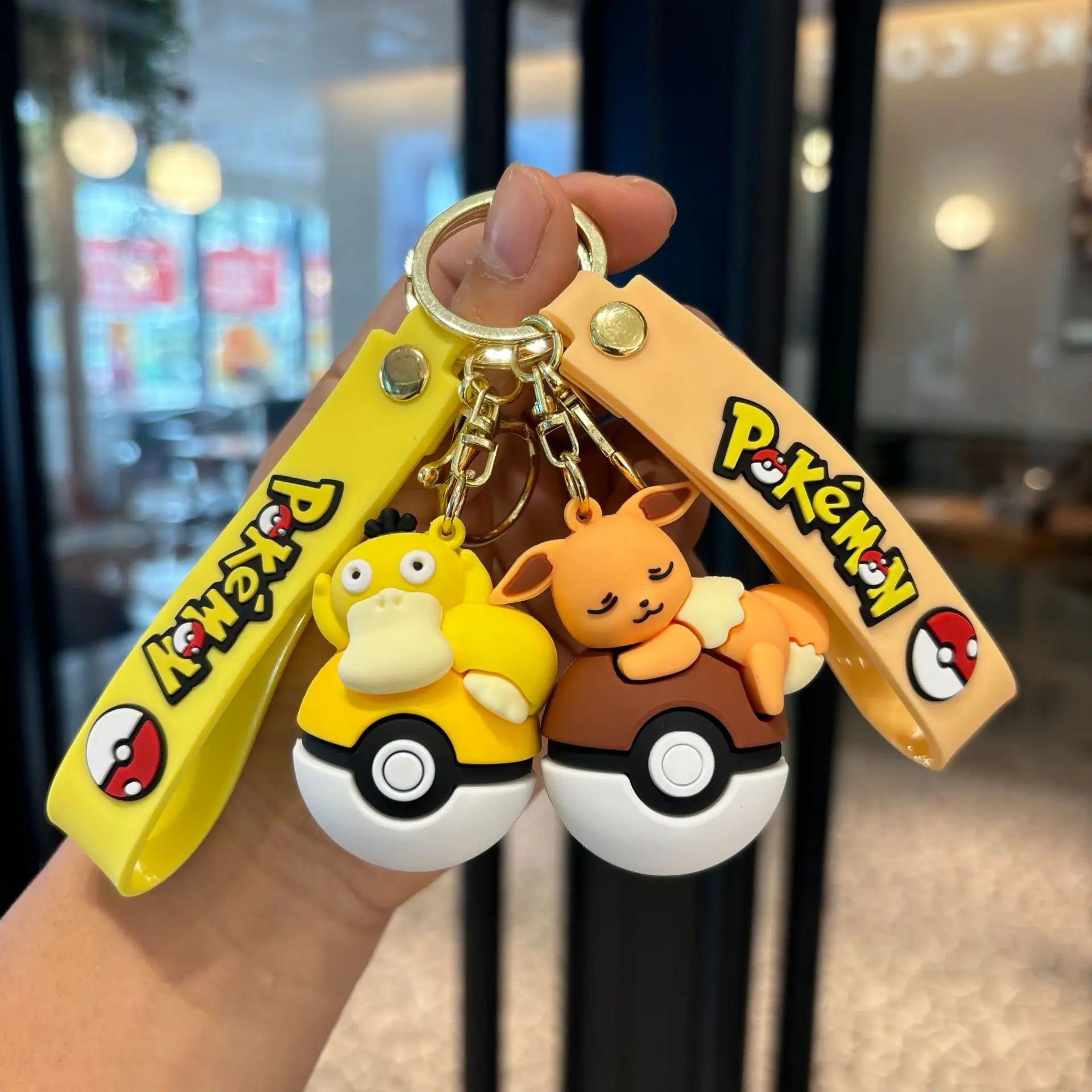 مجموعة سلسلة مفاتيح على شكل كرة بوكيمون بوكي، سلسلة مفاتيح على شكل شخصية بيكاتشو إيفي تشارماندر، حلقة مفاتيح قابلة للجمع من الرسوم المتحركة كهدية لحقيبة الظهر