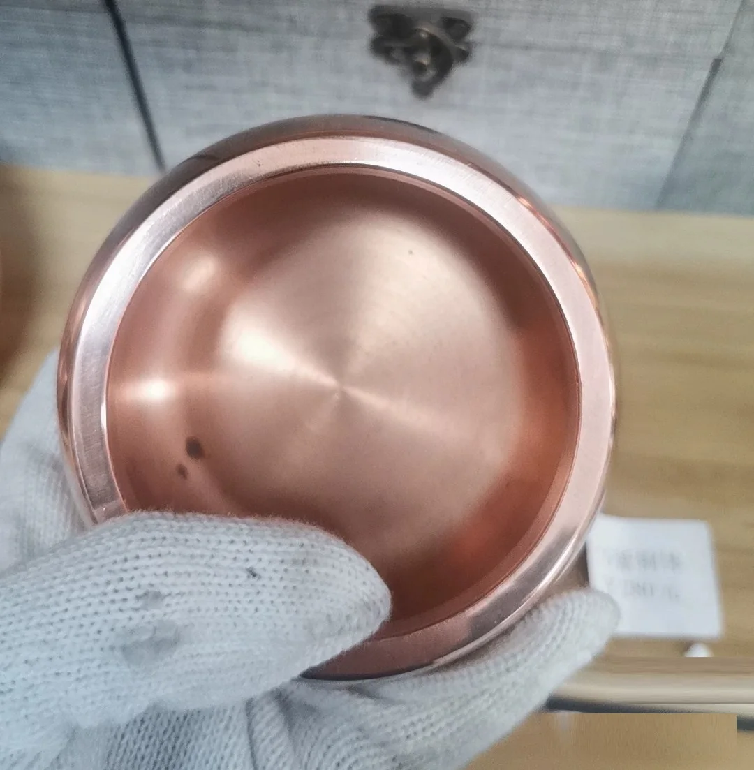 copper alms bowl