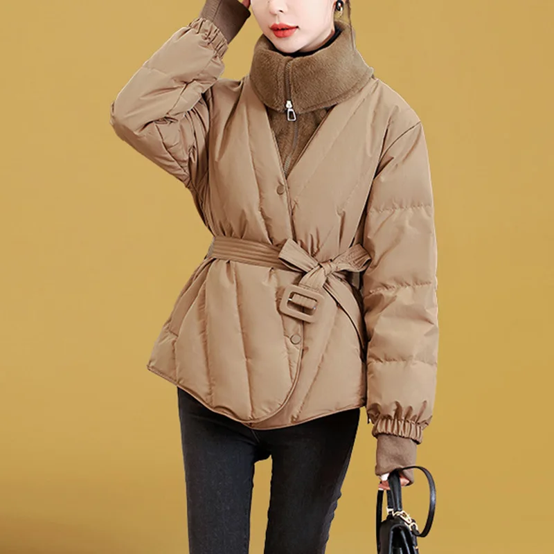 Winter fashion in 2023 new women's solid color turtleneck coat white duck down short Joker loose stitching warm down jacket.