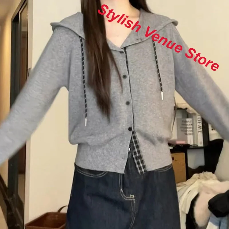 Korean advanced sense of fake two gray hooded sweater coat women's autumn and winter new fashion sweater casual cardigan top.
