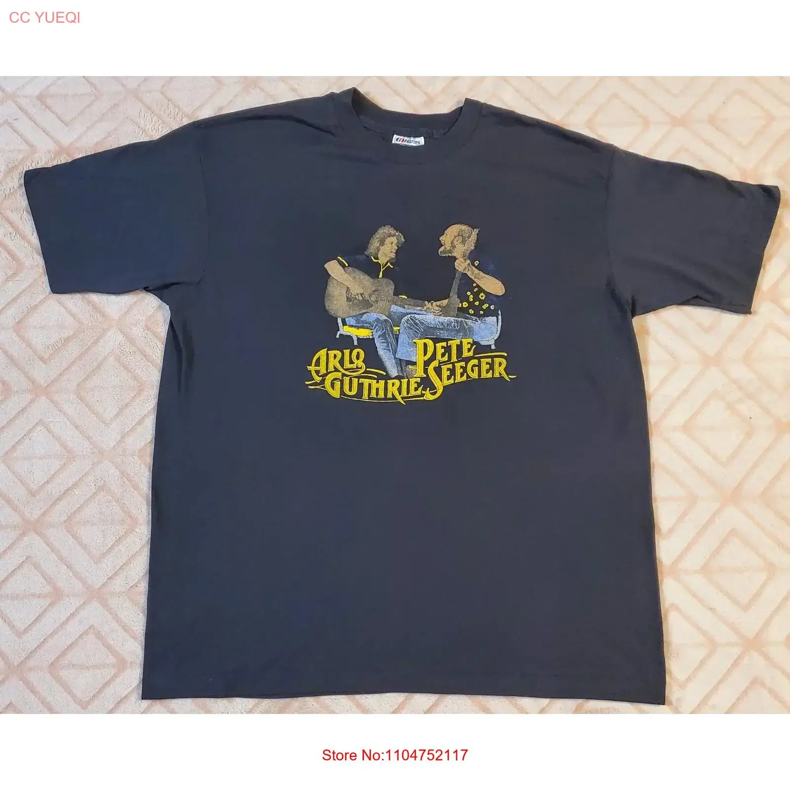 Camiseta vintage de los años 80 de la banda folclórica Arlo Guthrie y Pete Seeger, talla XL, muy rara, estilo vintage lavado, versátil, ligeramente desgastada.