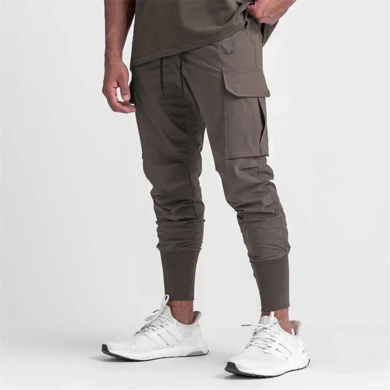 Pocket Nieuwe Heren Cargo Broek Zomer Dunne Slanke Sneldrogende Elastische Legging Hardlooptrainingsbroek Casual Trendbroek