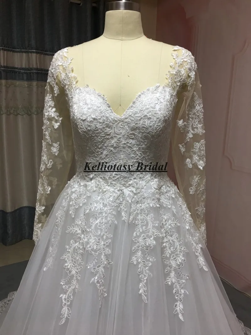 Vestido de novia hecho a medida con manga larga, vestidos de novia de tren largo con espalda con agujero