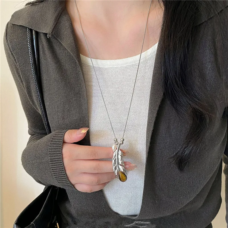 Korean Style Autumn Winter Plume Pearl Tiger Eye Stone Pendant Necklace for Women Unique Design Sweater Chain Accessory