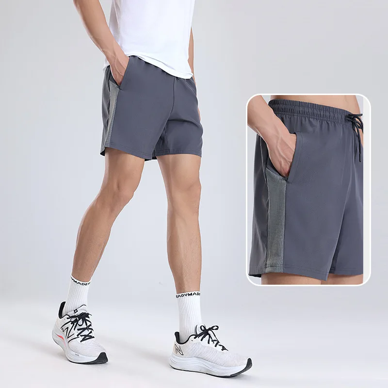 

2024 new Men's quick drying breathable sports shorts men's summer pants fitness running three part pants men's shorts clothing