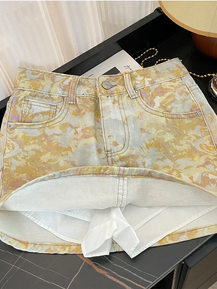 Novo coreano tie dye pintura a óleo impressão cintura alta a linha emagrecimento temperamento versátil meio corpo denim saia curta 2025