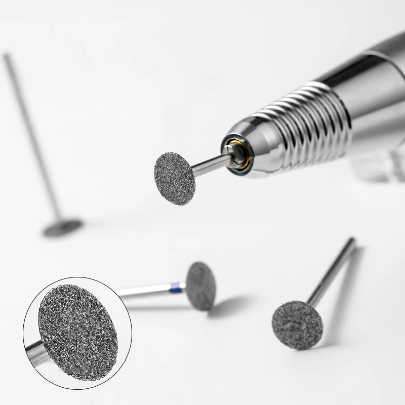 

1 шт. электрическое сверло для ногтей, диск, шлифовальные заусенцы, T-фрезы, шлифовальная машина, резак для кутикулы, художественные инструменты, головка для удаления полировки ногтей, алмазная головка
