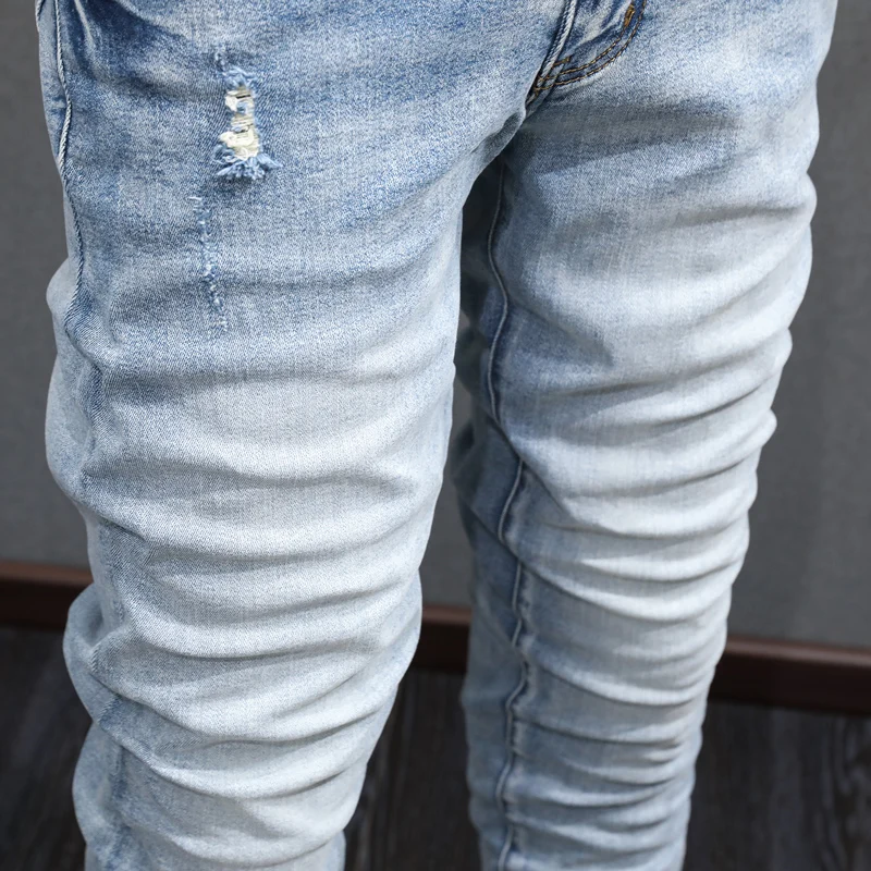 Latest designer fashion new men's jeans stretch slim fit high street hip-hop brand retro light blue pantshombre