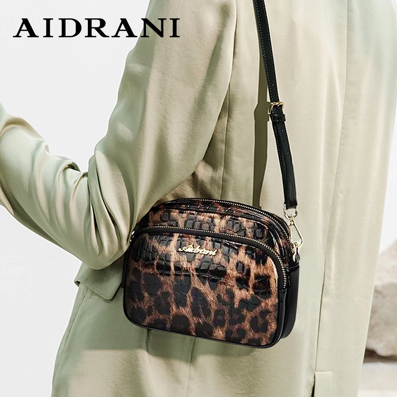 Aidrani Trendy women's one shoulder crossbody bag, round leopard print bag, made of high-quality cowhide material,