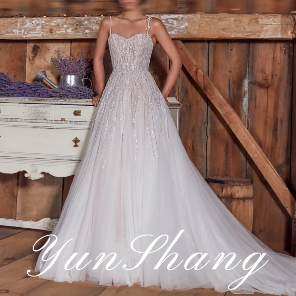 Yunshang Customized Spaghetti Strap Sleeveless Sweep Train Floor Length Backless Traditional Wedding Dress Charming High quality