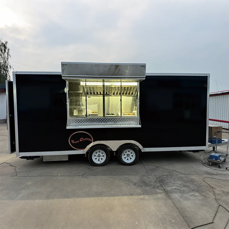 The outdoor food trailer boasts a striking visual impact that instantly catches the eye of passersby