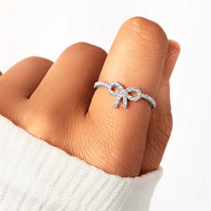 Huitan Dainty Shining Bowknot Ring Lady Engagement Accessories with Brilliant Cubic Zirconia Graceful Sweet Lady Daily Jewelry