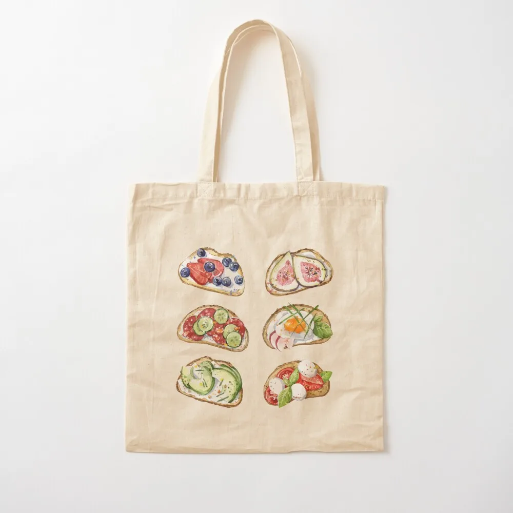 

Assorted Toast Bread With Toppings - Poached Egg, Figs, Avocado Salami, Bluberries, Tomatoes and Strawberries Tote Bag