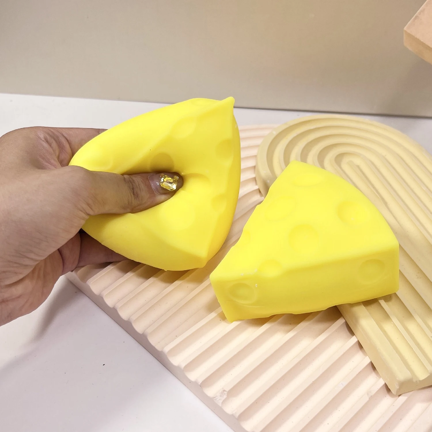 Cheese and cheese kneading toy, a stress relieving and venting tool, simulating cheese and cheese food play kneading