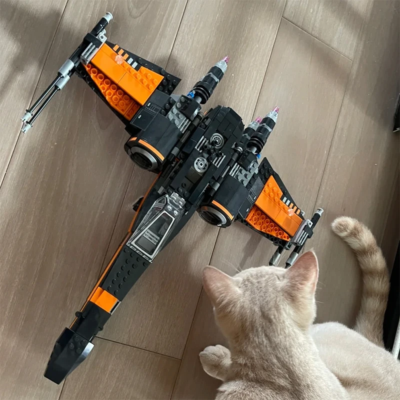 717 ชิ้น สินค้าใหม่ในสต็อก ชุดตัวต่อโมเดลยานอวกาศ X-wing Fighter ของโป สงครามอวกาศ ของเล่นตัวต่อประกอบเอง ของขวัญสำหรับเด็กผู้ชายและผู้ใหญ่