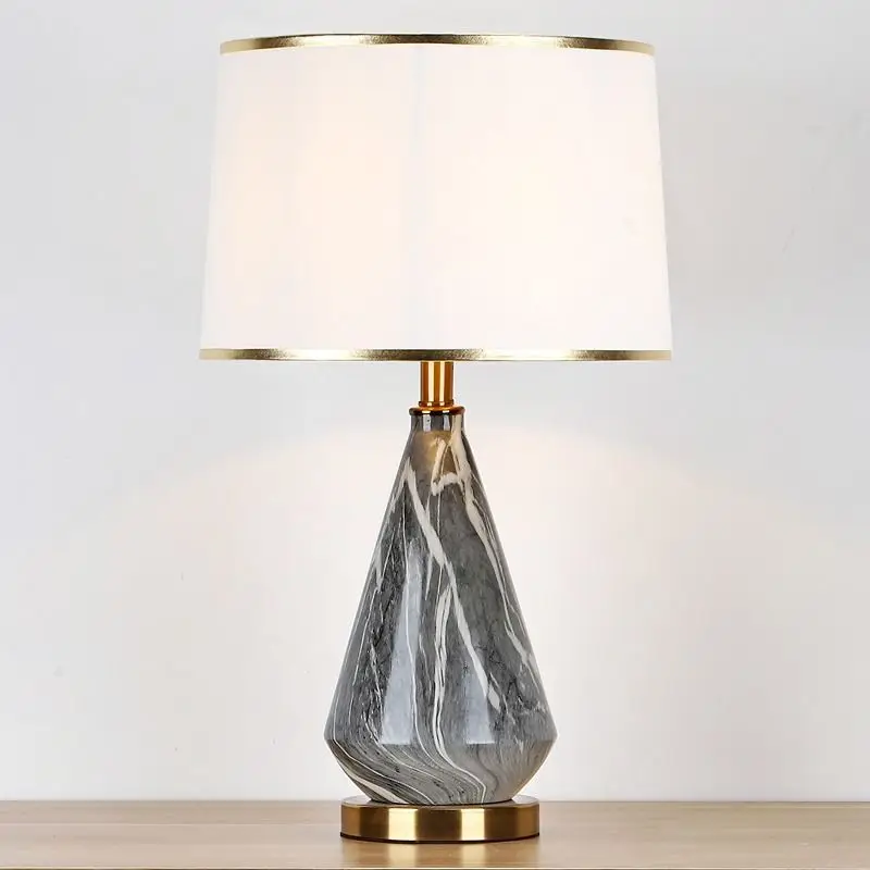 

Light luxury post-modern ceramic table lamp Nordic stone pattern bedside living room bedroom lamp Soft decoration model room hot