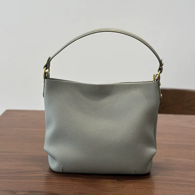 2026 New all-season hand-held crossbody bag for women, a genuine leather casual commuting bucket bag with top layer cowhide