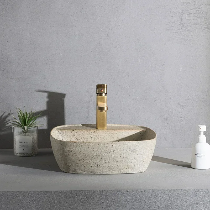 

Cream color ceramic basin small size balcony sink toilet wash sink art tools home renovation, outdoor courtyard of the hotel