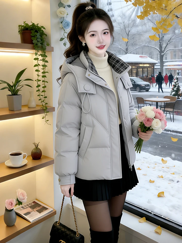 Modny, ocieplany płaszcz zimowy damski z bawełnianym wypełnieniem, idealny do dojazdów do pracy, w stylu koreańskim, długi, zapinany na zamek...