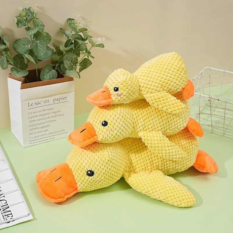 

Plush sleeping companion yellow duck, a pet toy that is tough to bite, grinds its teeth and makes sounds to relieve boredom