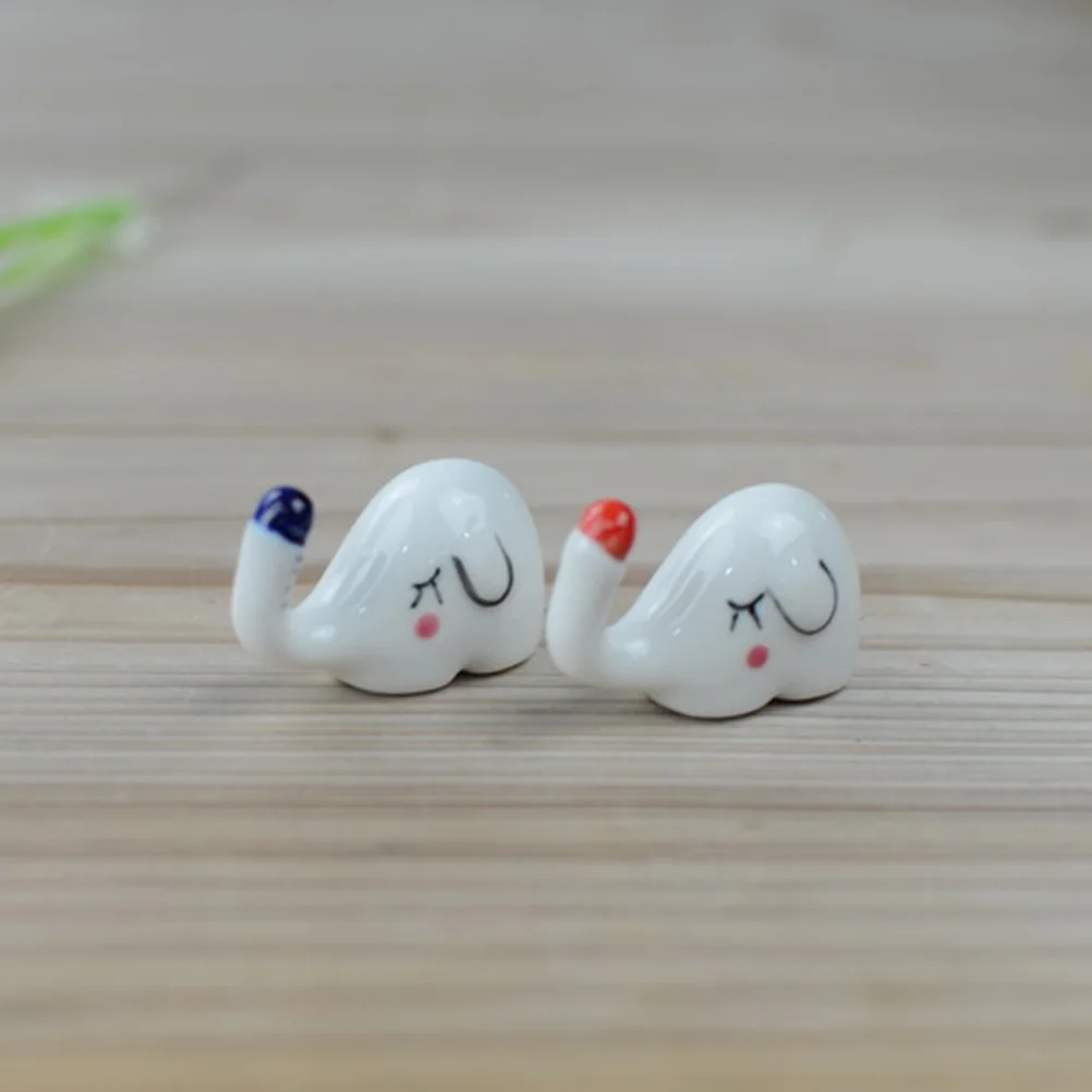 

4pcs A Pack Ceramics Household Chopsticks Stand Holder Chopstick Rest Rack Cartoon Elephant Shape Chopsticks Stand (Random Style