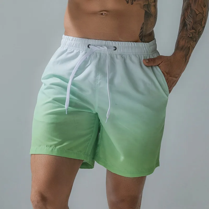 European size men's five-point gradual change of color printed sports shorts plus pants waterproof beach pants surf pants B0213
