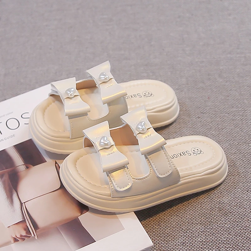 

Girls Beach Shoes Open Toes Sweet Bows Kids Princess Sandals Korean Style Versatile 2026 Brand New Children Slippers Soft Bottom