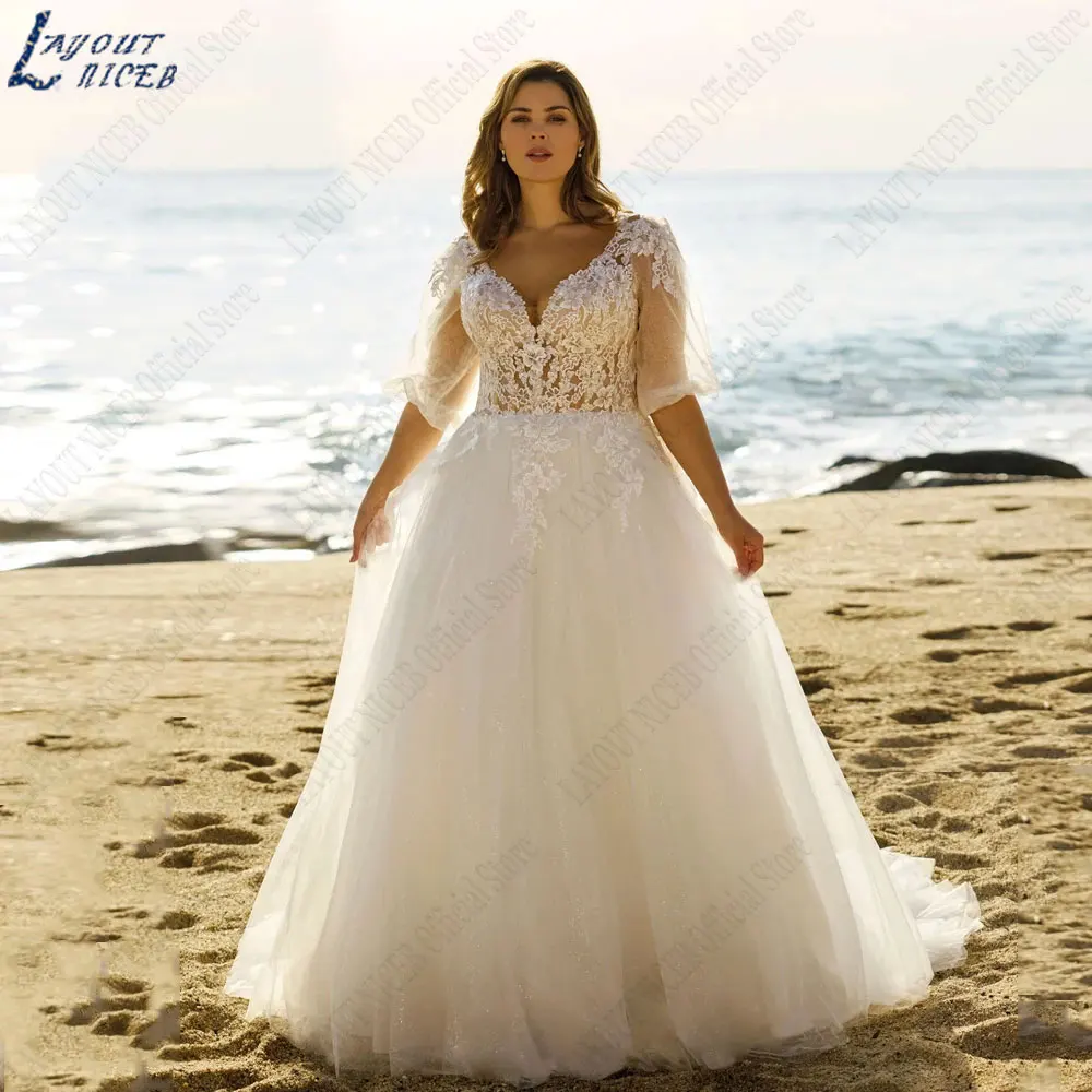 LAYOUT NICEB V-hals Plus size trouwjurk halve pofmouw A-lijn bruidsjurk backless appliques Tulle robe de mariee luxe 2024LAYOUT NICEB V-hals Plus size trouwjurk halve pofmouw A-lijn bruidsjurk backless appliques Tulle