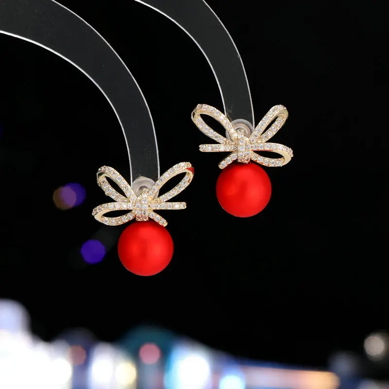 أقراط على شكل فيونكة للأذن لموسم الخريف والشتاء، إكسسوار أذن فريد وراقي أحمر وأكثر احتفالية وأنيقة للنساء جديد 2025