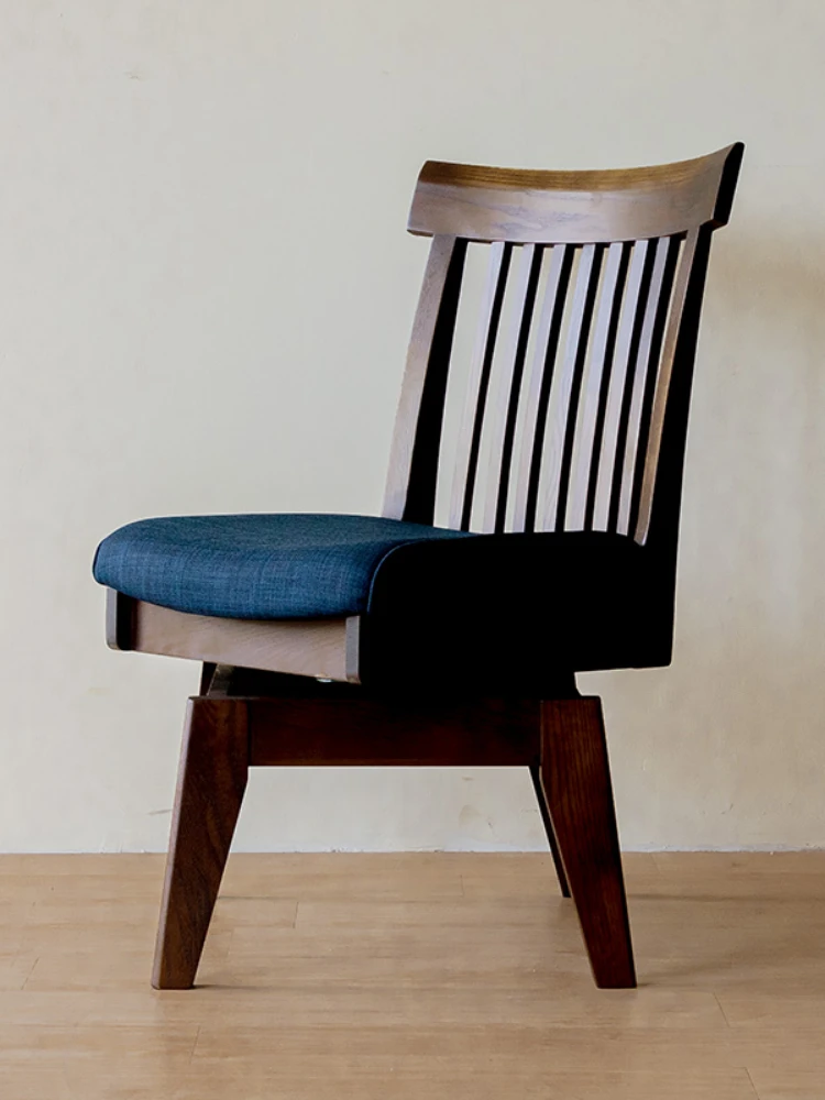 Solid wood swivel chair made of old and reworked dark red oak dining chair