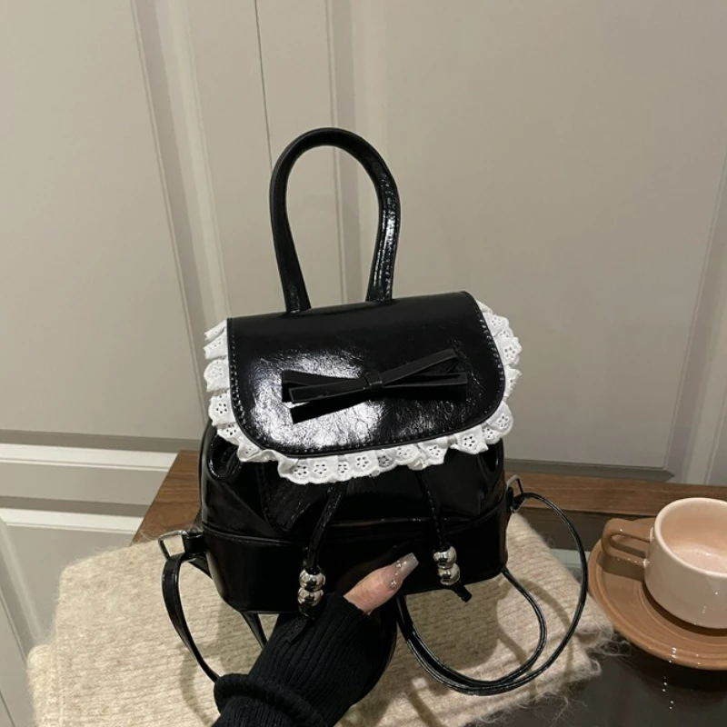 حقيبة ظهر نسائية كرتونية بسيطة للترفيه حقيبة مدرسية على طراز الباليه حقيبة دلو صغيرة مريحة ومتعددة الاستخدامات مع دانتيل على شكل فيونكة