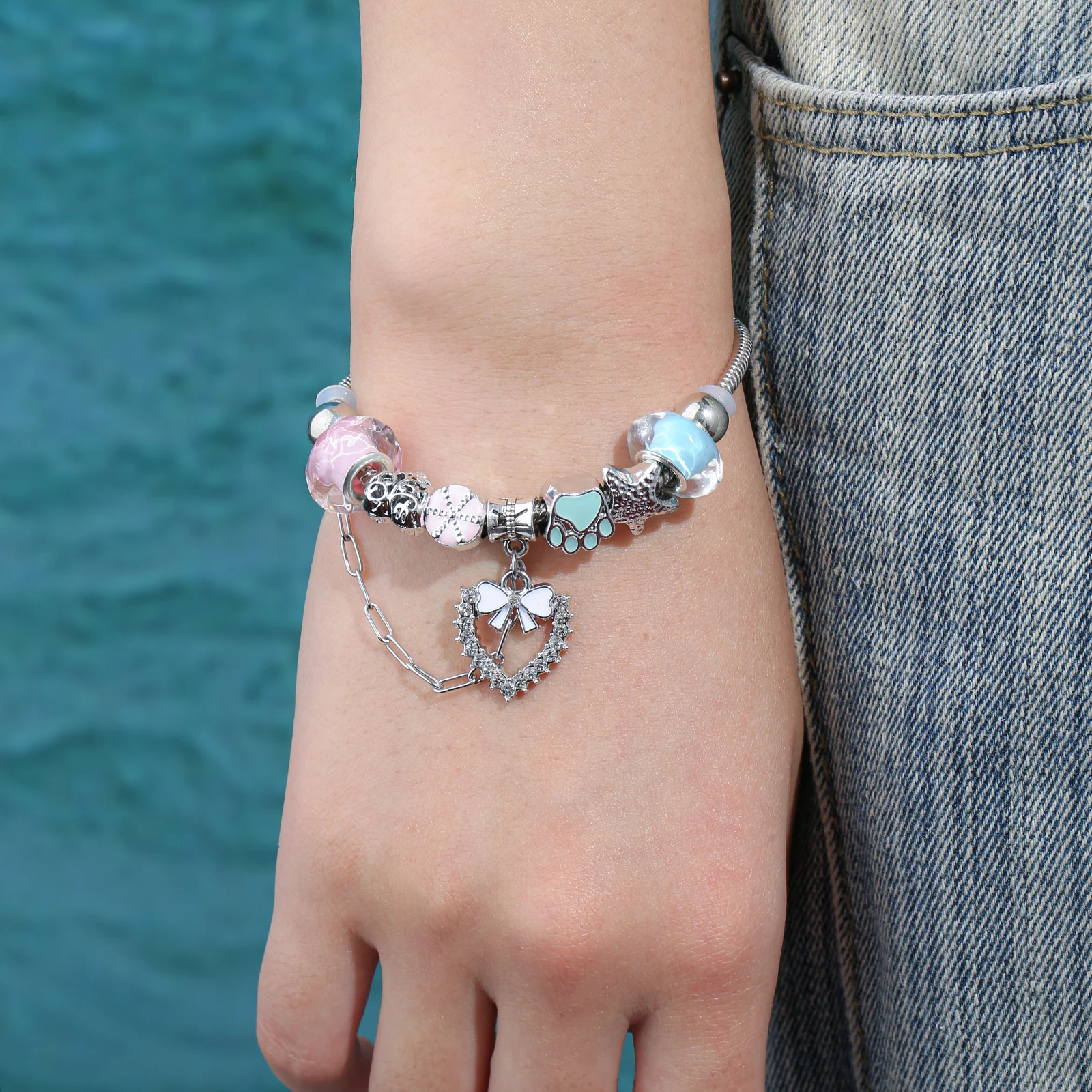 

Silvery Tone Stainless Steel Pandora-Style Charm Bracelet with Bow and Paw Charms for Women