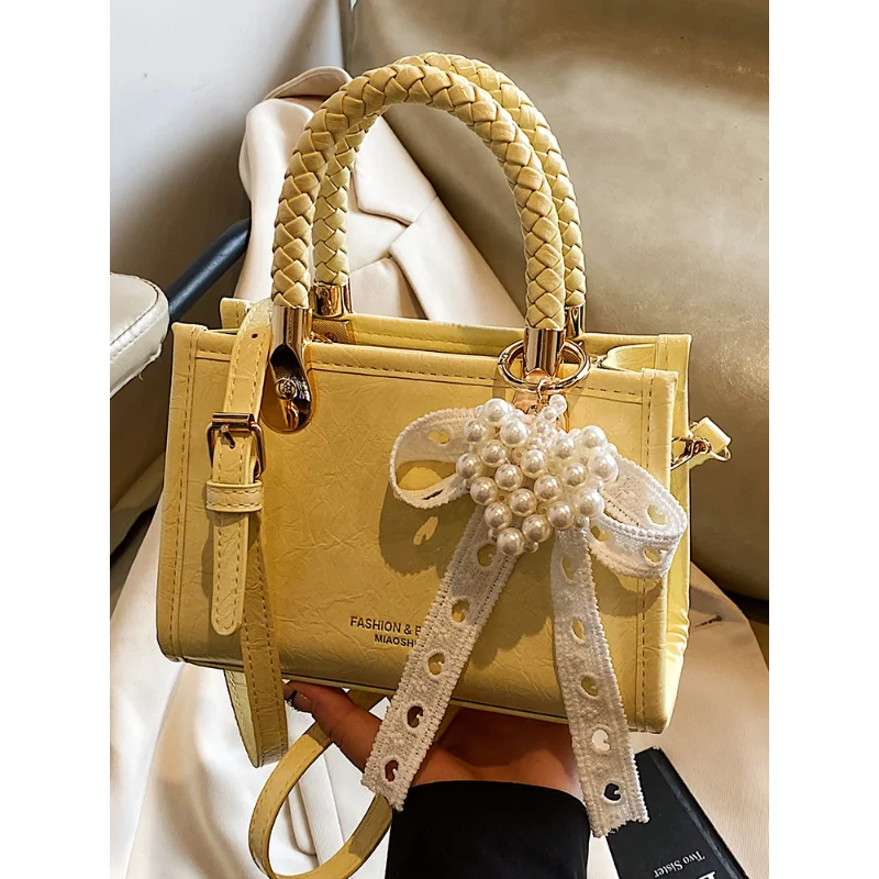 

Новая женская сумка в корейском стиле, нишевая, модная, простая, для повседневного использования, маленькая квадратная сумка через плечо.