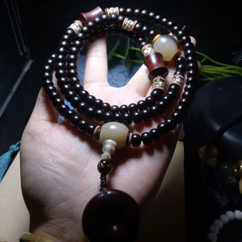 Carefully selected Indonesian black gold coconut shell 108-piece bracelet, barrel beads, handmade in natural color