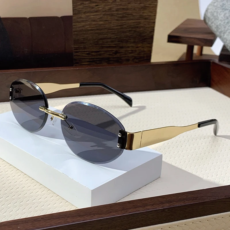 

Rimless Luxury Trendy Oval Sunglasses Summer Cut Edge Sunglass Brand Designer Shades Women Men Sun Glasses UV400 Eyewear 2025