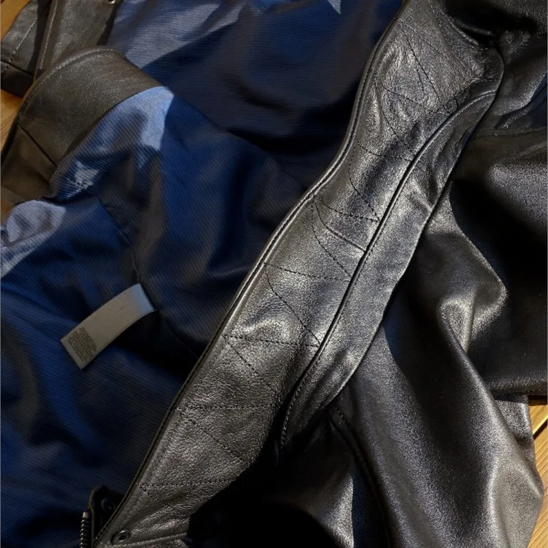 Top-grain vegetable-tanned cowhide designer version diagonal pull motorcycle men's leather  coat