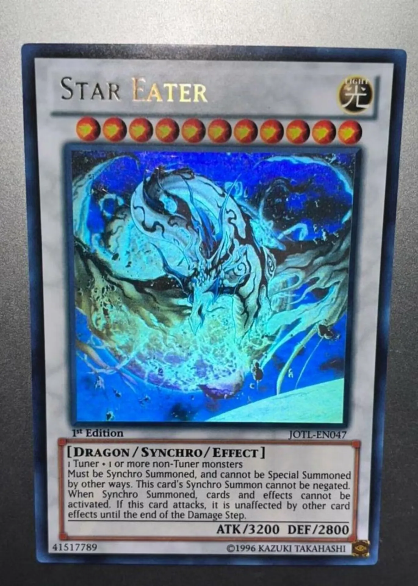 Yugioh KONAMI Duel Monsters JOTL-EN047 Star Eater Holographic Ghost Rare English 1st Edition Collection Mint Card