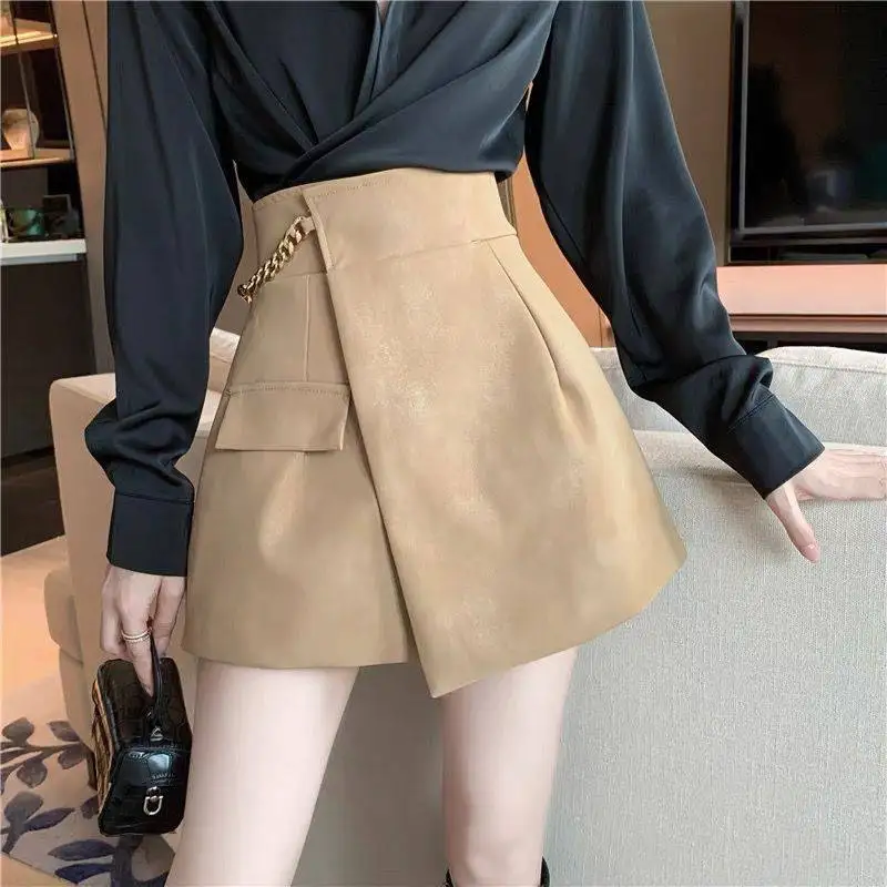 Irregular leather shorts women's autumn and winter design sense niche casual wide-leg pants slim Joker khaki skirt pants.