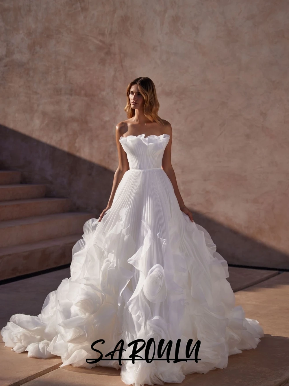 SAROULU Ethereal Strapless Bridal Gown 2026 Chic Layered Pleated Skirt Wedding Dress With Voluminous 3D Flowers Customized
