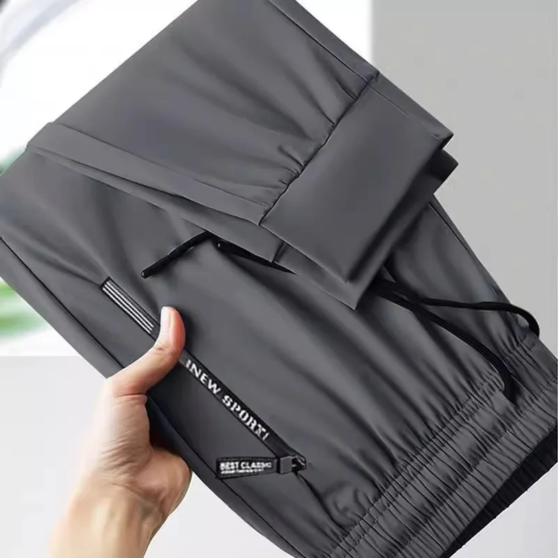 

Men's Summer Thin Ice Silk Spor Casual Pants with kets Elastic Waist Long Trousers for Work Lightweight Straight Leg Jeans