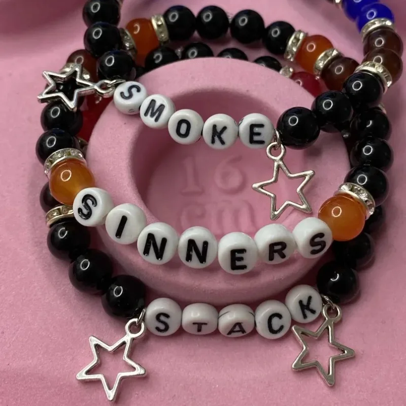 

Handmade red, black, and blue multi colored bead bracelet | Y2K | Smoked paired layered bracelet | Star pendant