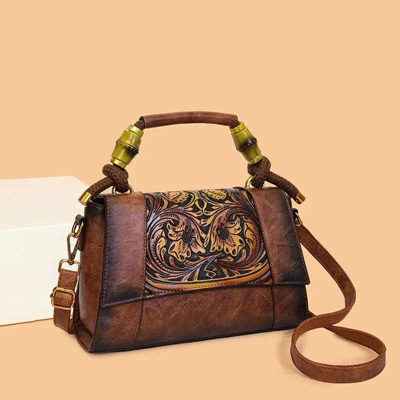 

Retro Handmade Ethnic Embossed Handbag Women's New Niche Personality Design High-end Sense Hand-to-hand Crossbody Bag Exquisite