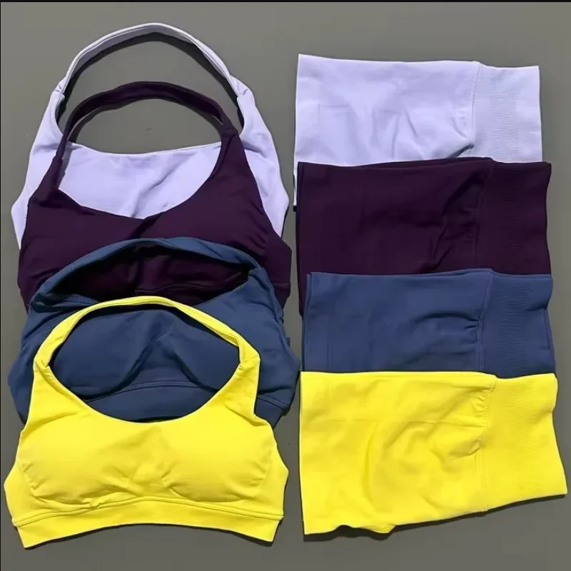 ชุดออกกำลังกายโยคะผู้หญิงคุณภาพสูงแบบใหม่ เสื้อกล้ามไร้ตะเข็บแบบผูกเชือก กางเกงขาสั้นออกกำลังกายแบบมีรอยขีดข่วน ชุดออกกำลังกายสำหรับผู้หญิง