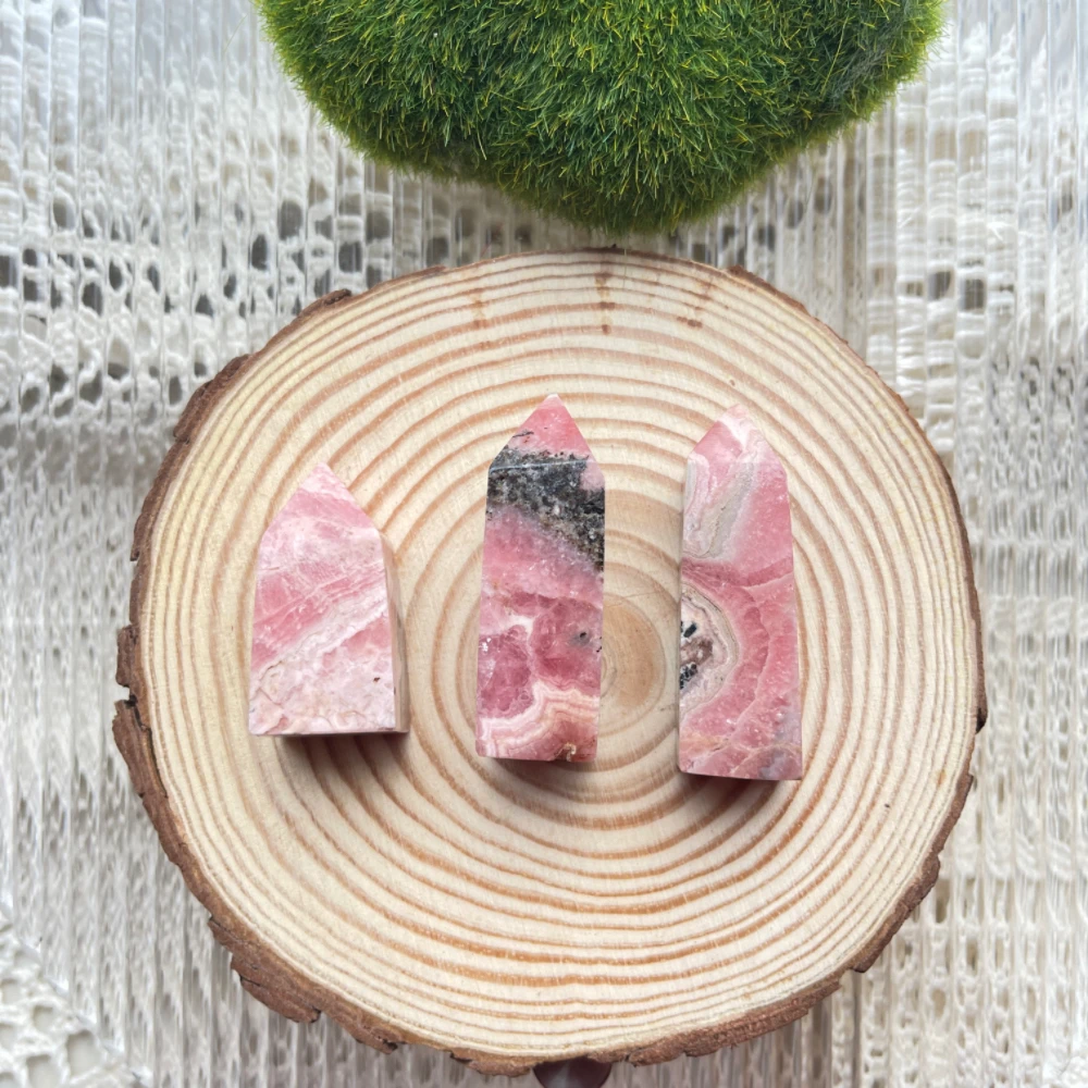 

Argentina natural Rhodochrosite pillars polished red crystal single point six prism pork belly texture decoration