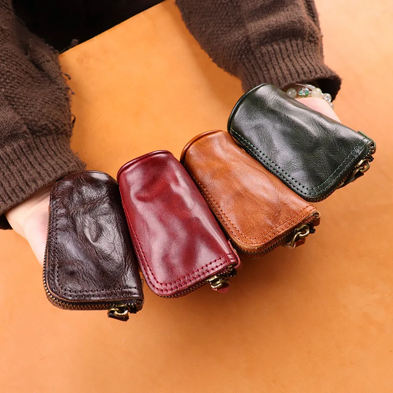 Real leather handmade key case with embossed design, large capacity zipper, car key storage handbag