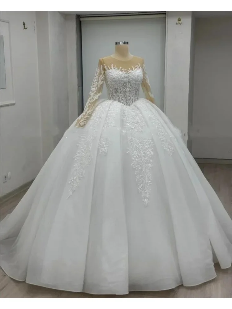 Customized 2026 Sparkly Ball Gown Wedding Dresses Illusion Long Sleeve Shiny Applique Saudi Bride Gown vestidos de novia