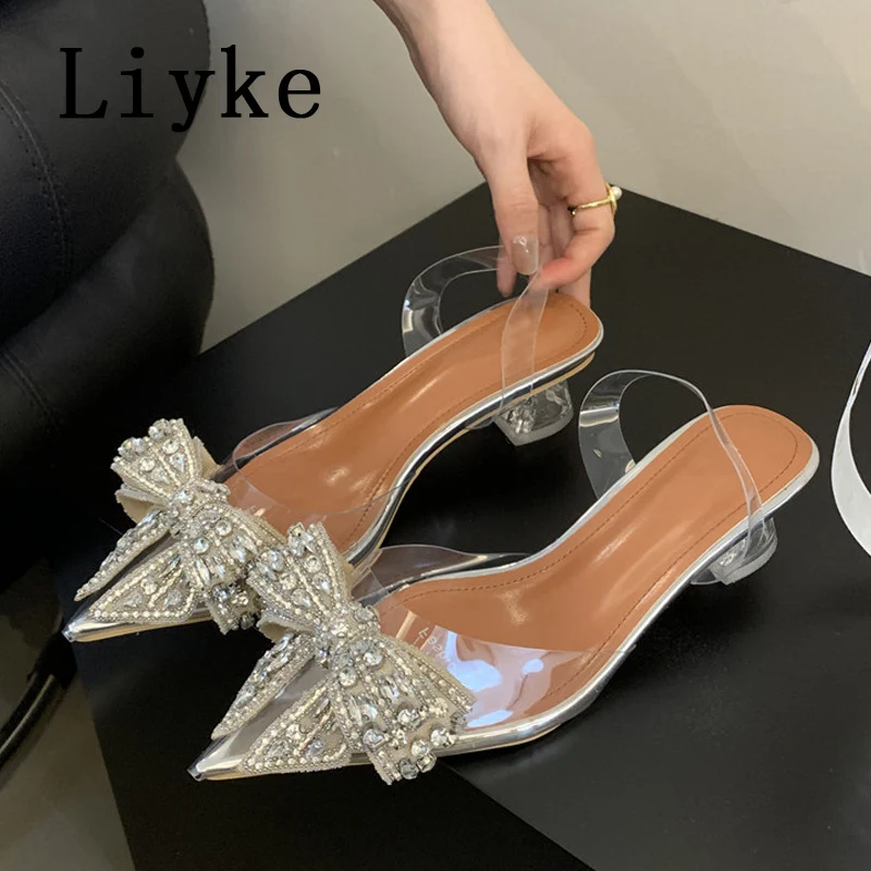 Liyke Fashion Design Crystal Bowknot Women Pumps Sexy Pointed Toe Clear High Heels Wedding Prom Shoes PVC Transparent Sandals