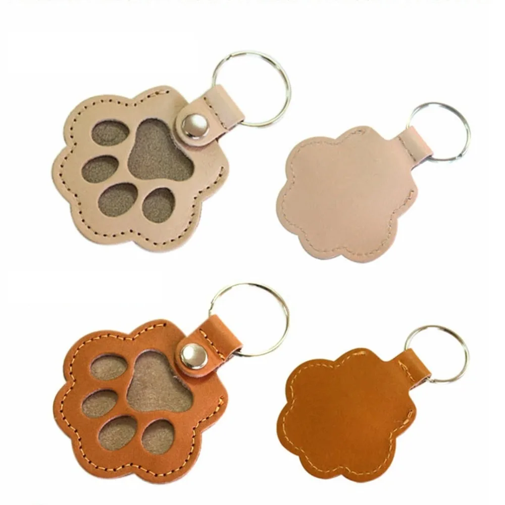 لطيف لطيف القط مخلب المفاتيح كيتي الإبداعية الحيوانات الأليفة الشعر حقيبة التخزين جرو بولي Leather الجلود الكلاب باو قلادة ظهره ديكور