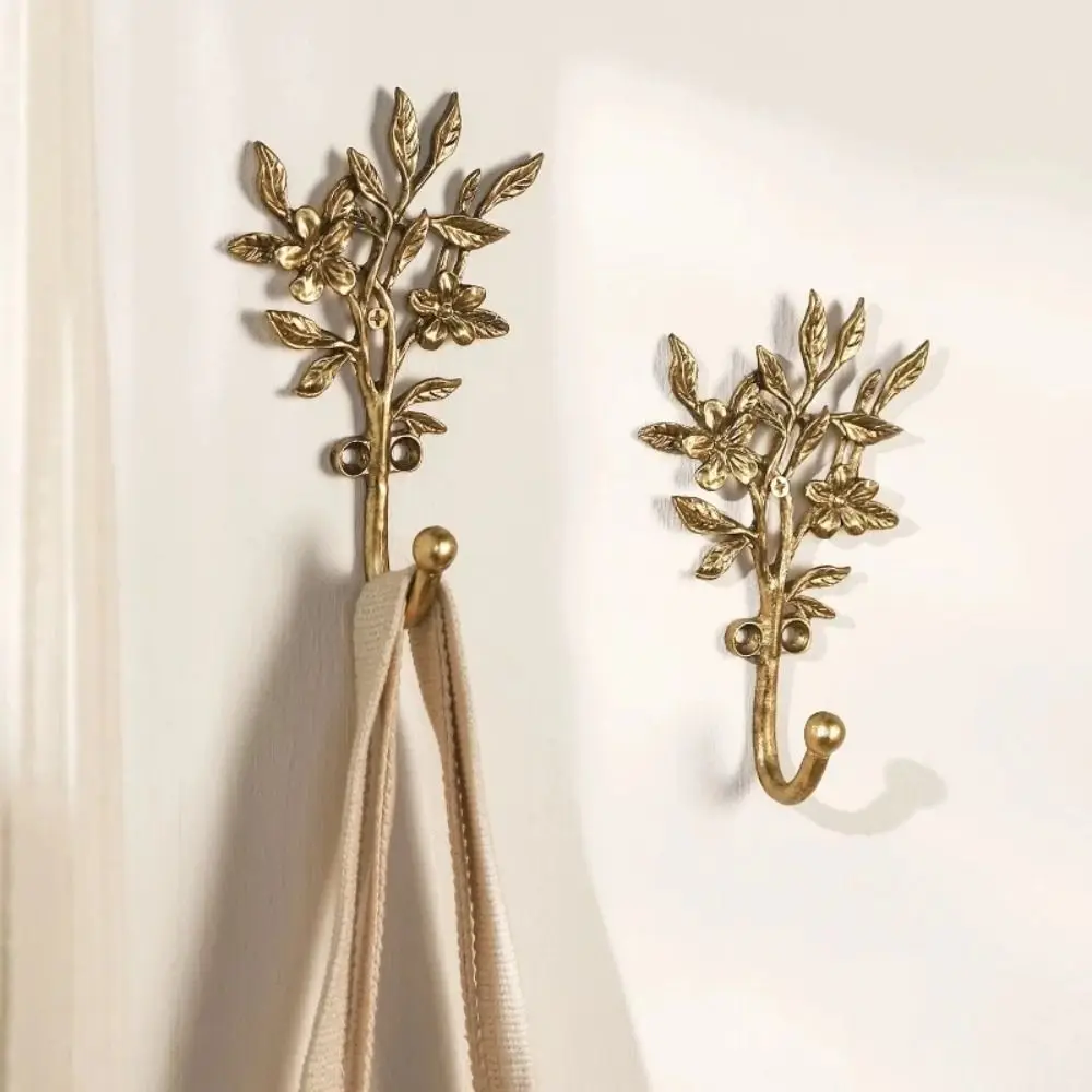 ganchos-de-parede-em-formato-de-folha-com-acabamento-dourado-design-elegante-conjunto-de-ganchos-decorativos-em-liga-resistente-estrutura-estavel-forte-capacidade-de-carga